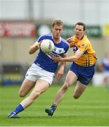 1 July 2017; Donal Kingston of Laois in action against Kevin Harnett of Clare during the GAA Football All-Ireland Senior Championship Round 2A match between Laois and Clare at O’Moore Park in Portlaoise, Co Laois. Photo by Ramsey Cardy/Sportsfile