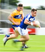 1 July 2017; John O'Loughlin of Laois in action against Jamie Malone of Clare during the GAA Football All-Ireland Senior Championship Round 2A match between Laois and Clare at O’Moore Park in Portlaoise, Co Laois. Photo by Ramsey Cardy/Sportsfile