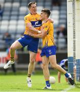 1 July 2017; Jamie Malone of Clare celebrates with Eoin Cleary, left, after scoring his side's first goal of the game during the GAA Football All-Ireland Senior Championship Round 2A match between Laois and Clare at O’Moore Park in Portlaoise, Co Laois. Photo by Ramsey Cardy/Sportsfile