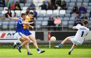 1 July 2017; Jamie Malone of Clare shoots to score his side's first goal of the game despite the efforts of Colm Begley, left, and Graham Brody of Laois during the GAA Football All-Ireland Senior Championship Round 2A match between Laois and Clare at O’Moore Park in Portlaoise, Co Laois. Photo by Ramsey Cardy/Sportsfile