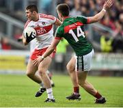 1 July 2017; Ciaran McFaul of Derry in action against Cillian O'Connor of Mayo during the GAA Football All-Ireland Senior Championship Round 2A match between Mayo and Derry at Elverys MacHale Park, in Castlebar, Co Mayo. Photo by David Maher/Sportsfile