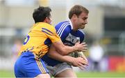 1 July 2017; Donal Kingston of Laois is tackled by Gordon Kelly of Clare during the GAA Football All-Ireland Senior Championship Round 2A match between Laois and Clare at O’Moore Park in Portlaoise, Co Laois. Photo by Ramsey Cardy/Sportsfile