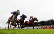 1 July 2017; Capri, left, with Seamie Heffernan up, beats second place Cracksman, right, with Pat Smullen up, and third place Wings Of Eagles, centre, with Ryan Moore up, on their way to winning the Dubai Duty Free Irish Derby during the Dubai Duty Free Irish Derby Festival 2017 on Saturday at the Curragh in Kildare. Photo by Seb Daly/Sportsfile