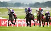 1 July 2017; Capri, left, with Seamie Heffernan up, beats second place Cracksman, right, with Pat Smullen up, and third place Wings Of Eagles, centre, with Ryan Moore up, on their way to winning the Dubai Duty Free Irish Derby during the Dubai Duty Free Irish Derby Festival 2017 on Saturday at the Curragh in Kildare. Photo by Seb Daly/Sportsfile