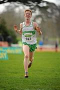 26 February 2012; Kevin Dooney, Raheny Shamrocks AC, crosses the finish line to win the Junior Men's race during the Woodie’s DIY AAI Inter Club Cross Country Championships of Ireland 2012. Santry Demesne, Santry, Dublin. Picture credit: Pat Murphy / SPORTSFILE