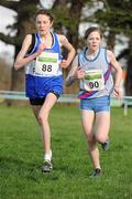 26 February 2012; Eventual winner Sarah Mary Collins, Finn Valley AC, races alongside second placed Siofra Cleirigh Buttner, Dundrum South Dublin AC, right, during the Junior Women's race during the Woodie’s DIY AAI Inter Club Cross Country Championships of Ireland 2012. Santry Demesne, Santry, Dublin. Picture credit: Pat Murphy / SPORTSFILE