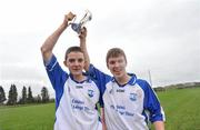 26 February 2012; Coláistí na nDéise players and brothers, Patrick, left, and Cathal Curran celebrate with the the cup after victory over Nenagh CBS. Dr Harty Cup Final, Coláistí na nDéise, Waterford, v Nenagh CBS, Tipperary, Cashel GAA Grounds, Cashel, Co. Tipperary. Picture credit: Diarmuid Greene / SPORTSFILE