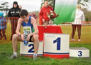 26 February 2012; Stephen Kerr, Armagh AC, shows his disappointment after finishing in second place in the Junior Men's race during the Woodie’s DIY AAI Inter Club Cross Country Championships of Ireland 2012. Santry Demesne, Santry, Dublin. Picture credit: Pat Murphy / SPORTSFILE