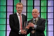 26 February 2012; In attendance at the Three FAI International Football Awards is James Walsh, left, St. Michaels FC, Tipperary Town, Co. Tipperary, winner of the Junior International player of the year award, with Paddy McCaul, President of the FAI. Three FAI International Football Awards, RTÉ Studios, Donnybrook, Dublin. Picture credit: David Maher / SPORTSFILE