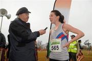 26 February 2012; Ava Hutchinson, Dundrum South Dublin AC, is interviewed by Frank Greally, Irish Runner magazine, after finishing in third place in the Senior Women's race at the Woodie’s DIY AAI Inter Club Cross Country Championships of Ireland 2012. Santry Demesne, Santry, Dublin. Picture credit: Pat Murphy / SPORTSFILE