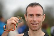 26 February 2012; Michael McDiarmada, Clonliffe Harriers AC, with his Bronze medal after the Senior Men's race at the Woodie’s DIY AAI Inter Club Cross Country Championships of Ireland 2012. Santry Demesne, Santry, Dublin. Picture credit: Pat Murphy / SPORTSFILE