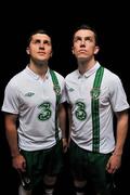 27 February 2012; Three, proud sponsors of the Republic of Ireland football team, today launches the new Umbro Republic of Ireland away jersey. Pictured wearing the new kit are Republic of Ireland players are Shane Long, left, and Kevin Foley. The Three sponsored jersey is available now and will be worn for the first time on the pitch for the Republic of Ireland’s Euro 2012 warm up friendly match against the Czech Republic on Wednesday 29th February. To celebrate the launch, Three is giving away 8 pairs of tickets to the match, just go to www.facebook.com/3Football for more details, terms and conditions and apply. Gannon Park, Malahide, Co. Dublin. Picture credit: David Maher / SPORTSFILE