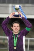 27 February 2012; Pearse College captain Kevin Fox lifts the Division 3 Cup. Umbro CUFL Third Division Final, Colaiste Ide 'C' v Pearse College, Oscar Traynor Centre, Coolock, Dublin. Picture credit: Pat Murphy / SPORTSFILE