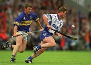 30 June 2002; Tony Browne, Waterford, in action against Noel Morris, Tipperary. Waterford v Tipperary, Guinness Munster Hurling Final, Pairc Ui Chaoimh, Cork. Picture credit; Brendan Moran / SPORTSFILE