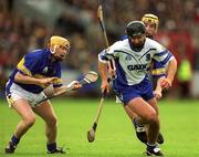 30 June 2002; Seamus Prendergast, Waterford, in action against Tipperary's Paul Ormonde, left, and Eamonn Corcoran. Waterford v Tipperary, Guinness Munster Hurling Final, Pairc Ui Chaoimh, Cork. Picture credit; Brendan Moran / SPORTSFILE
