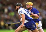 30 June 2002; Seamus Prendergast, Waterford, in action against Eamonn Corcoran, Tipperary. Waterford v Tipperary, Guinness Munster Hurling Final, Pairc Ui Chaoimh, Cork. Picture credit; Brendan Moran / SPORTSFILE