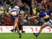 30 June 2002; Seamus Prendergast, Waterford, in action against Paul Kelly, Tipperary. Waterford v Tipperary, Guinness Munster Hurling Final, Pairc Ui Chaoimh, Cork. Picture credit; Ray McManus / SPORTSFILE