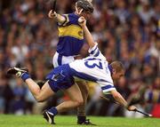 30 June 2002; Eoin McGrath, Waterford, in action against Thomas Costello, Tipperary. Waterford v Tipperary, Guinness Munster Hurling Final, Pairc Ui Chaoimh, Cork. Picture credit; Ray McManus / SPORTSFILE