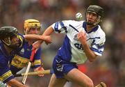 30 June 2002; James Murray, Waterford, in action against Thomas Dunne, Tipperary. Waterford v Tipperary, Guinness Munster Hurling Final, Pairc Ui Chaoimh, Cork. Picture credit; Ray McManus / SPORTSFILE