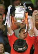 7 July 2002; Kieran McGeeney, Armagh captain lifts the Anglo Celt Cup. Armagh v Donegal, Ulster Football Final, St Tighearnachs Park, Clones, Co. Monaghan. Picture credit; David Maher / SPORTSFILE
