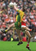 7 July 2002; John Gildea, Donegal, in action against Ronan Clarke, Armagh. Armagh v Donegal, Ulster   Football Final, St Tighearnachs Park, Clones, Co. Monaghan. Picture credit; Damien Eagers / SPORTSFILE