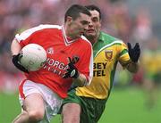 7 July 2002; Oisin McConville, Armagh, in action against Damien Diver, Donegal. Armagh v Donegal,   Ulster Football Final, St Tighearnachs Park, Clones, Co. Monaghan. Picture credit; Damien Eagers / SPORTSFILE