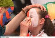 7 July 2002; A young Armagh fan has her face   painted before the game. Armagh v Donegal, Ulster Football Final, St Tighearnachs Park, Clones, Co. Monaghan. Picture credit; Damien Eagers / SPORTSFILE