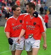 8 July 2002; Armagh's Kieran McGeeney, left, and Paul McGrane pictured after victory over Donegal. Armagh v Donegal, Ulster Football Final, St Tighearnachs Park, Clones, Co. Monaghan. Picture credit; Damien Eagers / SPORTSFILE
