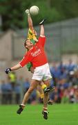 8 July 2002; Paul McGrane, Armagh, in action against John Gildea, Donegal. Armagh v Donegal, Ulster Football Final, St Tighearnachs Park, Clones, Co. Monaghan. Picture credit; Damien Eagers / SPORTSFILE