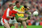 8 July 2002; Christy Toye, Donegal, in action against Armagh's Francie Bellew. Armagh v Donegal, Ulster Football Final, St Tighearnachs Park, Clones, Co. Monaghan. Picture credit; Damien Eagers / SPORTSFILE