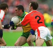 8 July 2002; Brendan Devenney, Donegal, in action against Armagh's Enda McNulty (2). Armagh v Donegal, Ulster Football Final, St Tighearnachs Park, Clones, Co. Monaghan. Picture credit; Damien Eagers / SPORTSFILE
