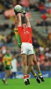 8 July 2002; John Toal, Armagh, in action against John Gildea, Donegal. Armagh v Donegal, Ulster Football Final, St Tighearnachs Park, Clones, Co. Monaghan. Picture credit; Damien Eagers / SPORTSFILE
