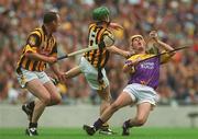 7 July 2002; Rory McCarthy, Wexford, in action against Kilkenny's Richard Mullally (5) and Andy Comerford. Wexford v Kilkenny, Guinness Leinster Senior Hurling Championship Final, Croke Park, Dublin. Picture credit; Aoife Rice / SPORTSFILE