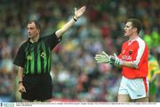 8 July 2002; Referee Seamus McCormack awards a free as Armagh's John McEntee appeals. Armagh v Donegal, Ulster Football Final, St Tighearnachs Park, Clones, Co. Monaghan. Picture credit; David Maher / SPORTSFILE