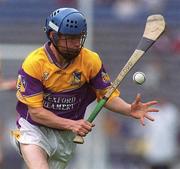 7 July 2002; Joe Codd, Wexford, in action against Michael Rice, Kilkenny. Wexford v Kilkenny, Guinness Leinster Minor Hurling Championship Final, Croke Park, Dublin. Picture credit; Brian Lawless / SPORTSFILE