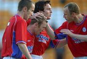 11 July 2002; Shelbourne's Tony McCarthy, right, Stewart Byrne and Ollie Cahill, left celebrate with team-mate Trevor Molloy, who's cross was hit into the Drogheda net by Gary Cronin. Shelbourne v Drogheda United, eircom League Premier Division, Tolka Park, Dublin. Soccer. Picture credit; Ray McManus / SPORTSFILE *EDI*