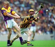 7 July 2002; John Roche, Wexford, in action against James Fitzpatrick, Kilkenny. Wexford v Kilkenny, Leinster Minor Hurling Championship Final, Croke Park, Dublin. Picture credit; Aoife Rice / SPORTSFILE