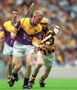 7 July 2002; John Roche, Wexford, in action against James Fitzpatrick, Kilkenny. Wexford v Kilkenny, Leinster Minor Hurling Championship Final, Croke Park, Dublin. Picture credit; Aoife Rice / SPORTSFILE
