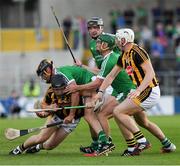 1 July 2017; Mark Bergin prepares to pass the sliothar to his Kilkenny team mate Liam Blanchfield, right, as he comes under pressure from Limerick players, from left, James Ryan, Declan Hannon and Sean Finn during the GAA Hurling All-Ireland Senior Championship Round 1 match between Kilkenny and Limerick at Nowlan Park in Kilkenny. Photo by Ray McManus/Sportsfile