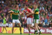 2 July 2017; Donncha O'Connor of Cork during a coming together with Fionn Fitzgerald, left, and Peter Crowley of Kerry during the Munster GAA Football Senior Championship Final match between Kerry and Cork at Fitzgerald Stadium in Killarney, Co Kerry. Photo by Eóin Noonan/Sportsfile