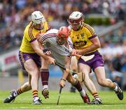 2 July 2017; Conor Whelan of Galway in action against James Breen, left, and Liam Ryan of Wexford during the Leinster GAA Hurling Senior Championship Final match between Galway and Wexford at Croke Park in Dublin. Photo by Ray McManus/Sportsfile