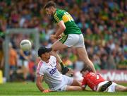 2 July 2017; Paul Geaney of Kerry scores his side's only goal despite the best efforts of Cork goalkeeper Ken O'Halloran and Kevin Crowley during the Munster GAA Football Senior Championship Final match between Kerry and Cork at Fitzgerald Stadium in Killarney, Co Kerry. Photo by Brendan Moran/Sportsfile