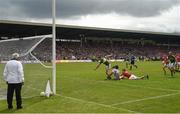 2 July 2017; Paul Geaney of Kerry scores his side's only goal despite the best efforts of Cork goalkeeper Ken O'Halloran and Kevin Crowley during the Munster GAA Football Senior Championship Final match between Kerry and Cork at Fitzgerald Stadium in Killarney, Co Kerry. Photo by Brendan Moran/Sportsfile