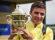 2 July 2017; Jockey Andrea Atzeni with the trophy after winning the Pretty Polly Stakes on Nezwaah during the Dubai Duty Free Irish Derby Festival 2017 on Sunday at the Curragh in Kildare. Photo by Seb Daly/Sportsfile