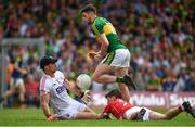 2 July 2017; Paul Geaney of Kerry scores his side's only goal despite the best efforts of Cork goalkeeper Ken O'Halloran and Kevin Crowley during the Munster GAA Football Senior Championship Final match between Kerry and Cork at Fitzgerald Stadium in Killarney, Co Kerry. Photo by Brendan Moran/Sportsfile