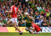 2 July 2017; Paul Murphy of Kerry is tackled by Jamie O'Sullivan of Cork resulting in a black card for O'Sullivan during the Munster GAA Football Senior Championship Final match between Kerry and Cork at Fitzgerald Stadium in Killarney, Co Kerry. Photo by Brendan Moran/Sportsfile
