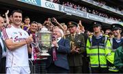2 July 2017; The President of Ireland Michael D Higgins and the Galway captain David Burke celebrate with the Bob O'Keeffe Cup after the Leinster GAA Hurling Senior Championship Final match between Galway and Wexford at Croke Park in Dublin. Photo by Ray McManus/Sportsfile