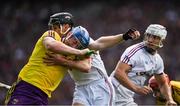 2 July 2017; Jack Guiney of Wexford is tackled by Aidan Harte of Galway during the Leinster GAA Hurling Senior Championship Final match between Galway and Wexford at Croke Park in Dublin. Photo by Ray McManus/Sportsfile