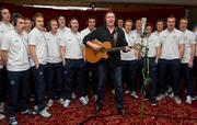 28 February 2012; Singer Damien Dempsey with members of the Republic of Ireland squad as they add their vocals to the Ray D'Arcy shows' recently recorded 'Rocky Road to Poland', the Official Euro 2012 Song for the Republic of Ireland soccer squad. Portmarnock Hotel and Golf Links, Portmarnock, Co. Dublin. Picture credit: David Maher / SPORTSFILE