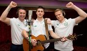 28 February 2012; Republic of Ireland captain Robbie Keane, left, Shane Long, on guitar, and Damien Duff add their vocals to the Ray D'Arcy shows' recently recorded 'Rocky Road to Poland', the Official Euro 2012 Song for the Republic of Ireland soccer squad. Portmarnock Hotel and Golf Links, Portmarnock, Co. Dublin. Picture credit: David Maher / SPORTSFILE